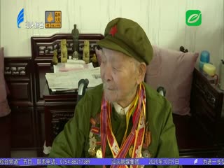 纪念章送给老战士