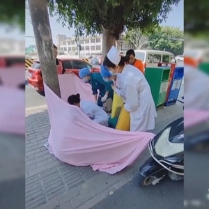 孕妇路上生子   众人接力“搭产房”